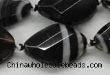 CAA286 22*30mm twisted & faceted oval black line agate beads