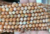 CABS15 15 inches 6mm round orange calcite gemstone beads wholesale