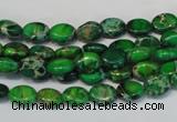 CDI178 15.5 inches 6*8mm oval dyed imperial jasper beads