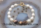 CFB970 Hand-knotted 9mm - 10mm rice white freshwater pearl & brown zebra jasper bracelet