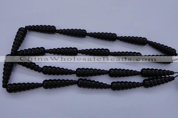 CFG761 15.5 inches 10*35mm carved teardrop black agate beads